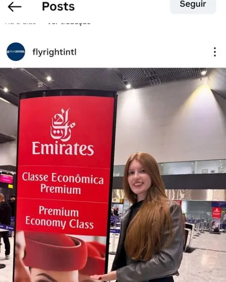Maria Eduarda embarcando pela Emirates.